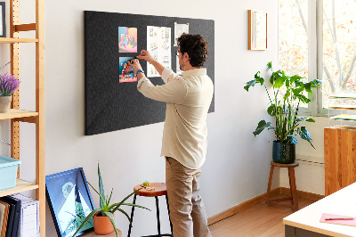 Prikbord zwart met gekleurde spelden