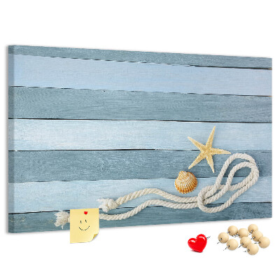 Prikbord met afbeelding van zeegezicht met schelpen en touw