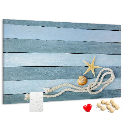 Prikbord met afbeelding van zeegezicht met schelpen en touw