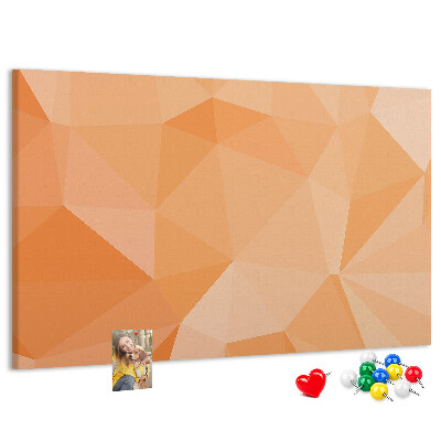 Prikbord met geometrische driehoeken in oranjetinten