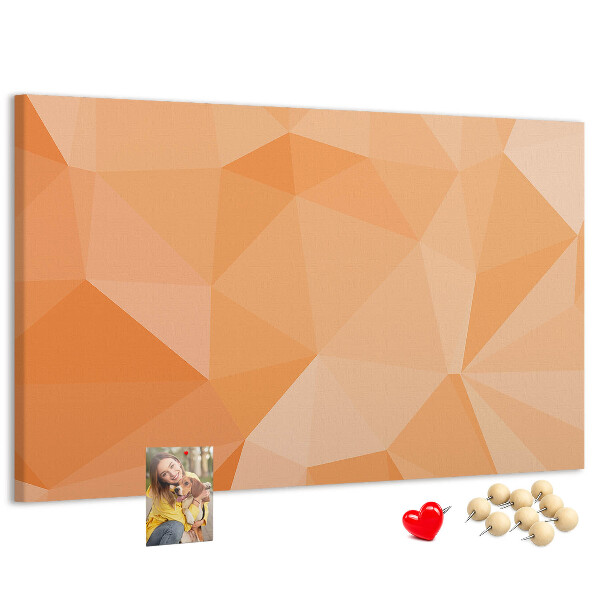 Prikbord met geometrische driehoeken in oranjetinten