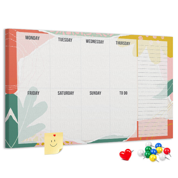 Kurkbord met bloemenkalender en kleurrijke accenten