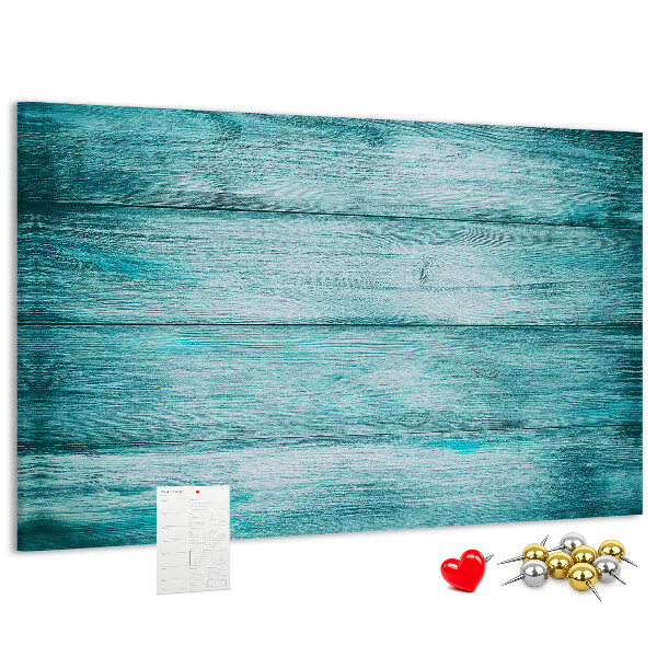 Kurkbord met achtergrond van groene en blauwe houten planken