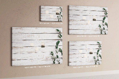 Kurk prikbord met rustiek hout en groene takken
