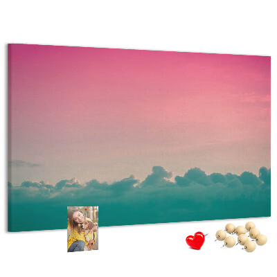 Prikbord zonsondergang boven de wolken in pastelkleuren
