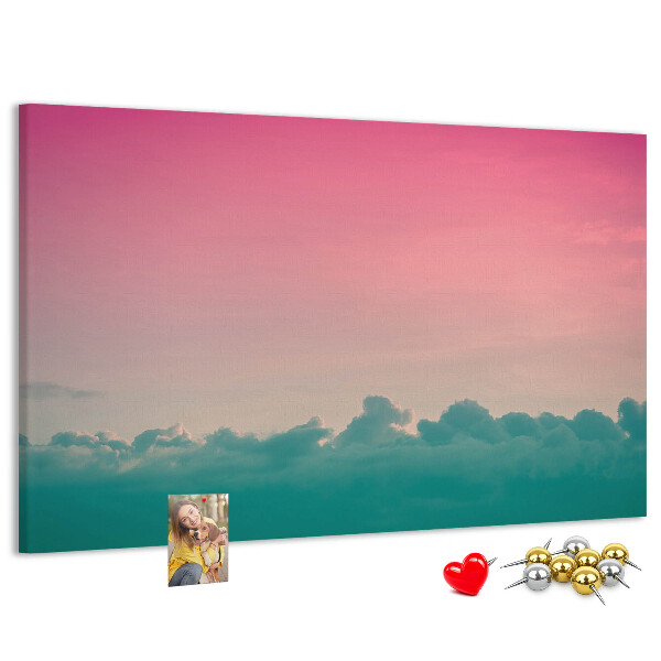 Prikbord zonsondergang boven de wolken in pastelkleuren
