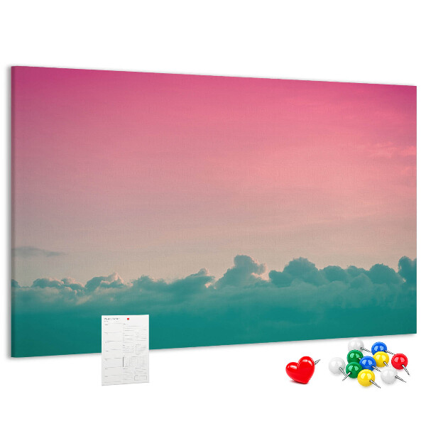 Prikbord zonsondergang boven de wolken in pastelkleuren