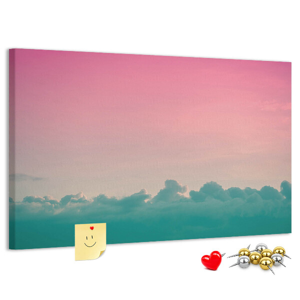 Prikbord zonsondergang boven de wolken in pastelkleuren