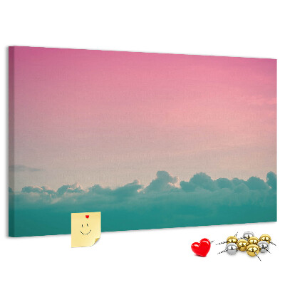 Prikbord zonsondergang boven de wolken in pastelkleuren