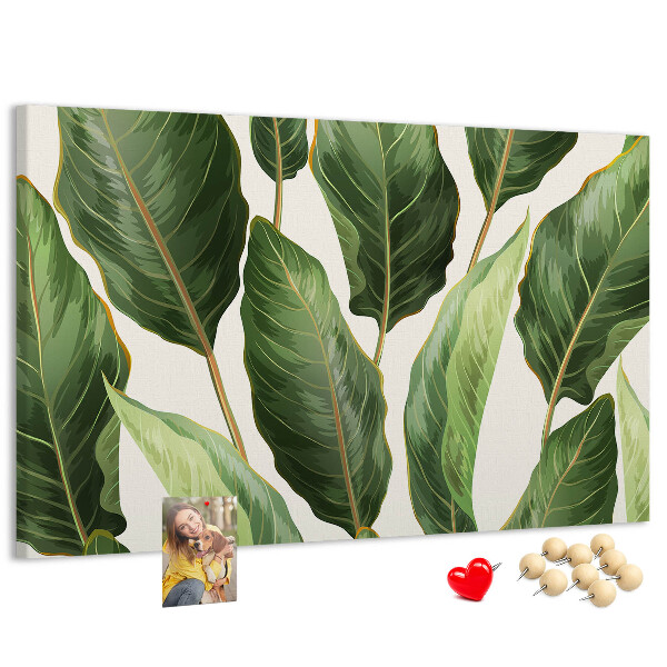 Kurk prikbord met print van tropische bladeren in verschillende tinten groen