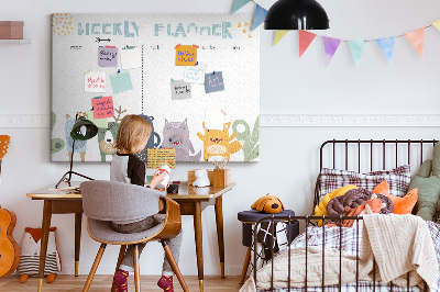 Kurkbord met kleurrijke weekplanner en dierenprint