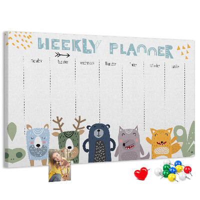 Kurkbord met kleurrijke weekplanner en dierenprint