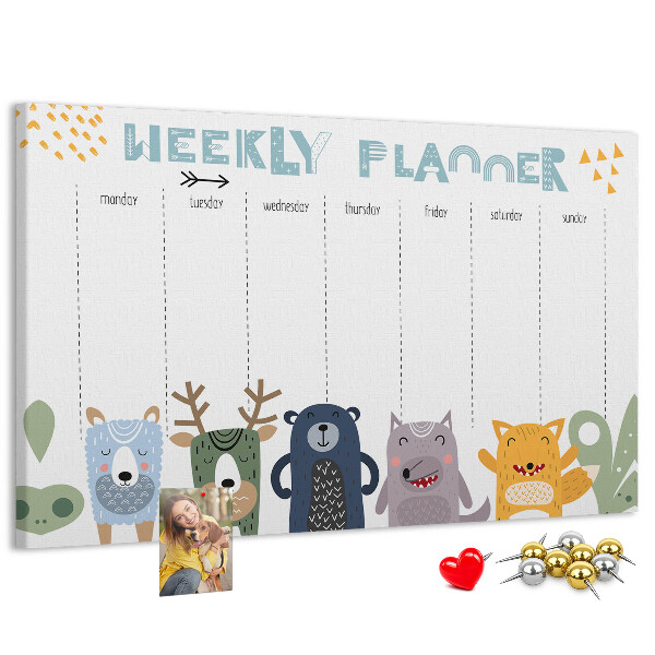 Kurkbord met kleurrijke weekplanner en dierenprint