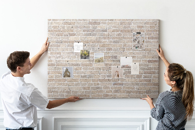 Kurkbord met een stijlvolle print van een bakstenen muur in neutrale tinten