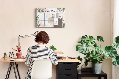 Kurken prikbord maandkalender met bloemenaccenten