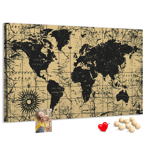 Prikbord met een oude wereldkaart in zwart en goud