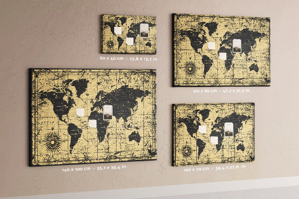 Prikbord met een oude wereldkaart in zwart en goud