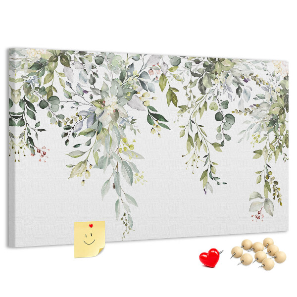 Kurken prikbord met een motief van groene bladeren en tere bloemen