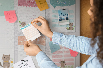 Kurken prikbord met schattige katjes op kleurrijke briefjes