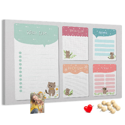 Kurken prikbord met schattige katjes op kleurrijke briefjes