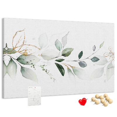 Prikbord met fijne blaadjes en gouden accenten