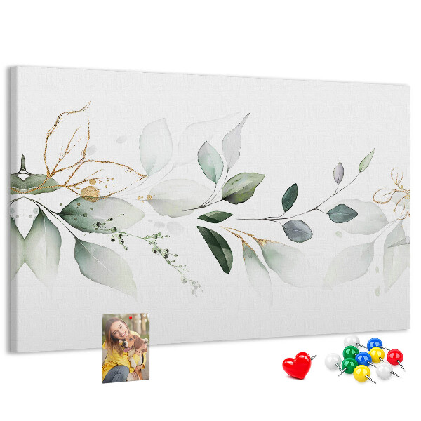 Prikbord met fijne blaadjes en gouden accenten