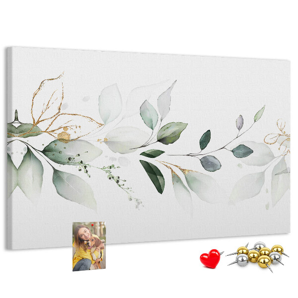 Prikbord met fijne blaadjes en gouden accenten