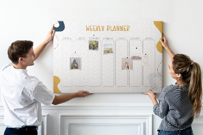 Kurkbord weekplanner met een abstract kleurrijk patroon