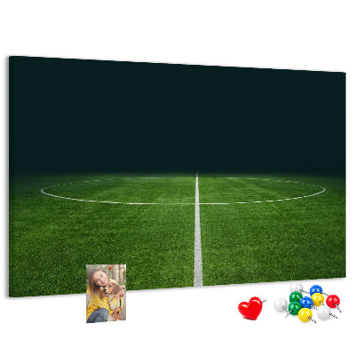 Kurk prikbord voetbalveld met belijning en gras