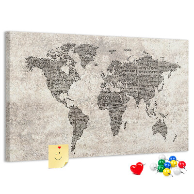 Prikbord met een wereldkaart en krantentextuur