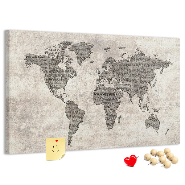 Prikbord met een wereldkaart en krantentextuur