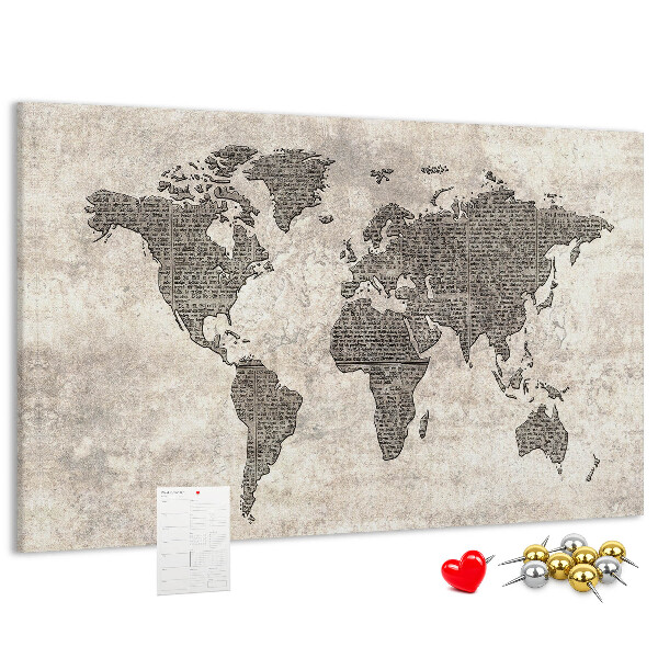 Prikbord met een wereldkaart en krantentextuur