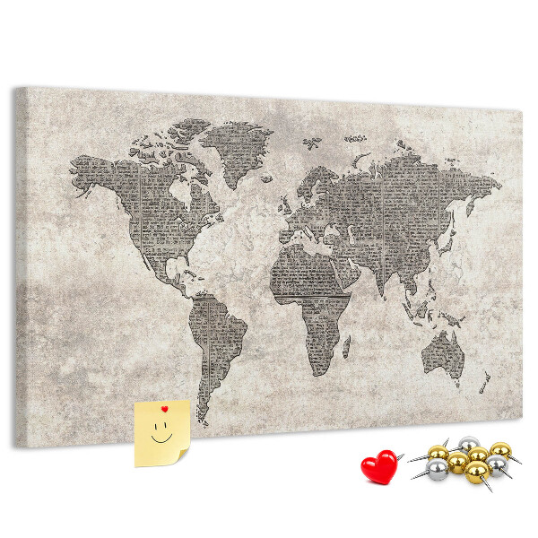 Prikbord met een wereldkaart en krantentextuur