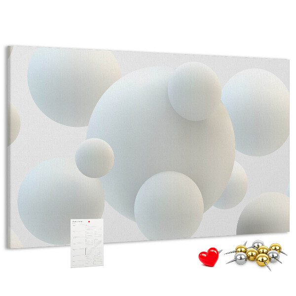 Kurk prikbord met witte ballen op een lichte achtergrond