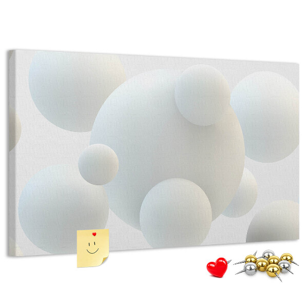 Kurk prikbord met witte ballen op een lichte achtergrond