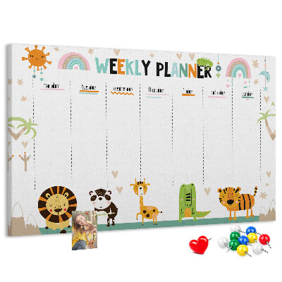 Kurk prikbord met een kleurrijke weekplanner en dierenprint