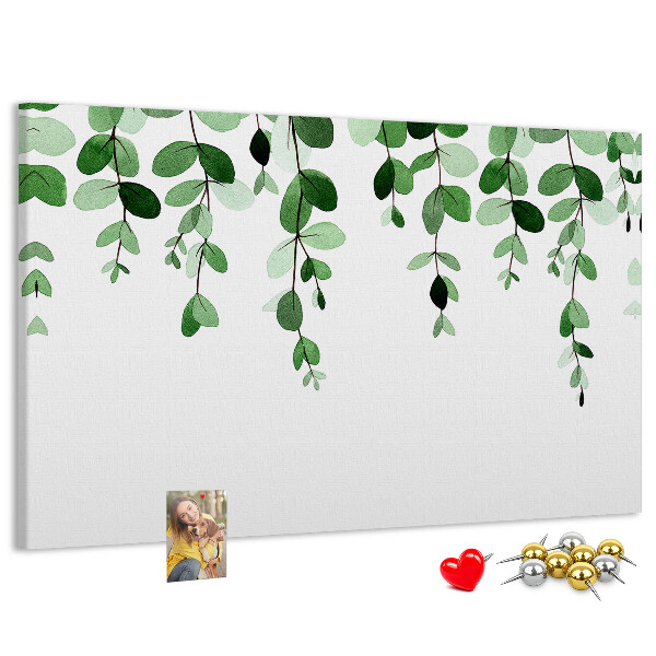 Prikbord met een print van groene bladeren in een verfijnde aquareltechniek