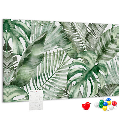 Prikbord met print van tropische bladeren in verschillende tinten groen
