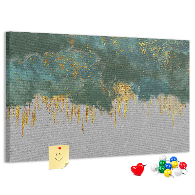 Prikbord met gouden druppels op een blauwe wolkenachtergrond