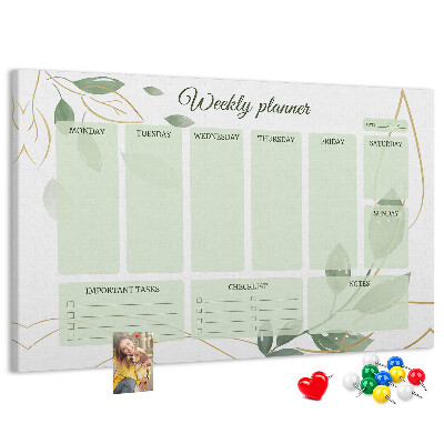 Prikbord groene weekplanner met plantenaccenten