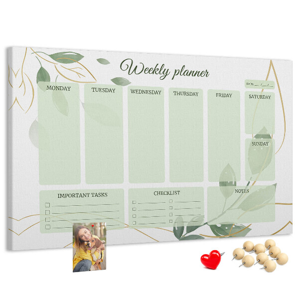 Prikbord groene weekplanner met plantenaccenten