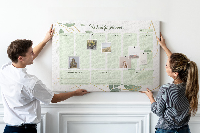 Prikbord groene weekplanner met plantenaccenten