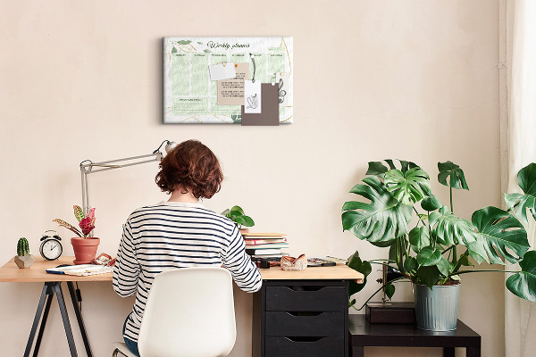 Prikbord groene weekplanner met plantenaccenten