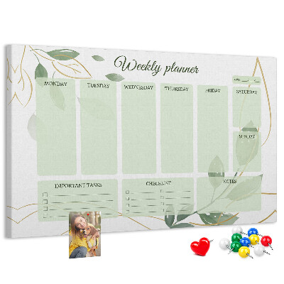 Prikbord groene weekplanner met plantenaccenten