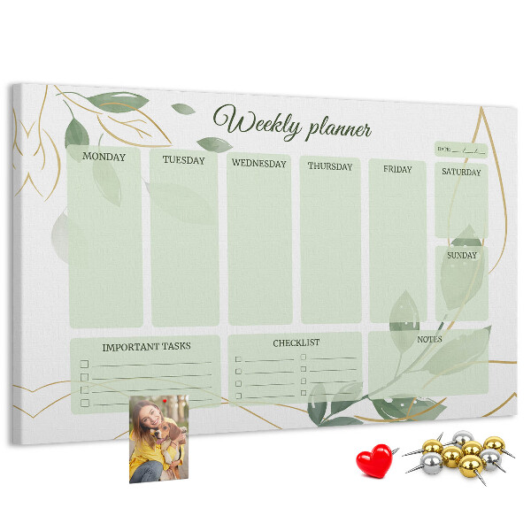 Prikbord groene weekplanner met plantenaccenten