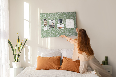 Prikbord met bladmotief en fijne lijnen