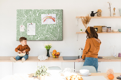 Prikbord met bladmotief en fijne lijnen