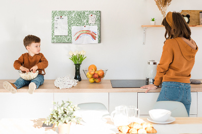 Prikbord met bladmotief en fijne lijnen