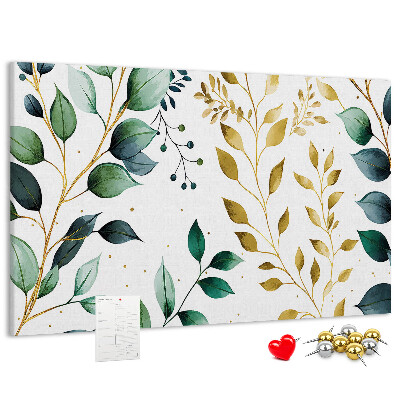 Kurkbord met gouden bladeren op een lichte achtergrond