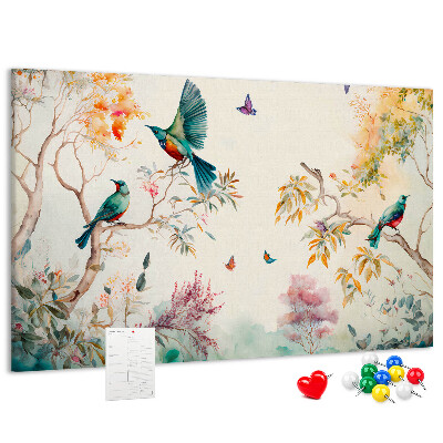 Prikbord met een afbeelding van kleurrijke vogels in een lentelandschap
